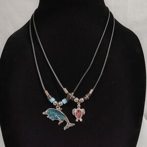 Silver and Blue Fish & A Silver And Ruby Turtle Pendant Necklaces (2)